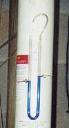 This is a picture of the "U" tube Manometer that shows the Radon system's operating performance of the fan installed.